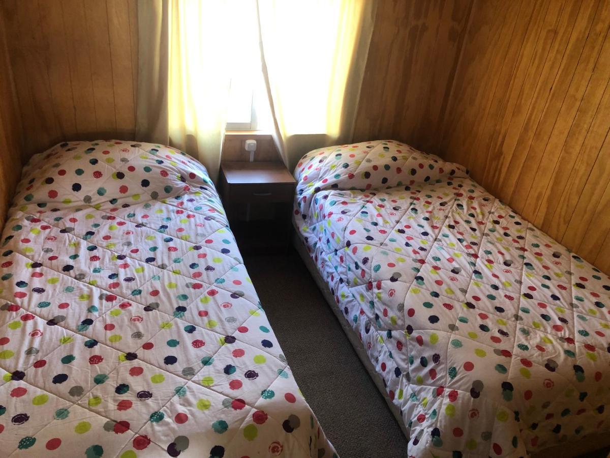 Hostal Huepil Pucón Esterno foto